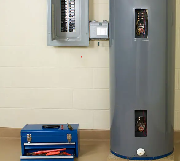 Electric water heater next to an electrical panel during a check